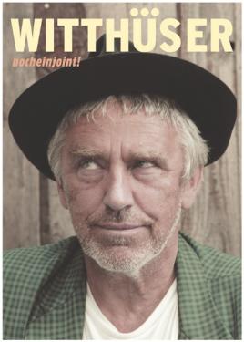 an old man with his hat on